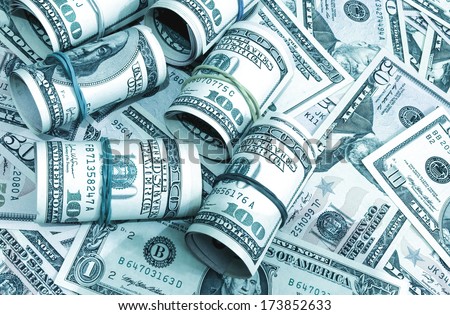 Dollars seamless background. High resolution wallpaper texture of rolled in a tube one hundred and flat fifty banknotes toned in blue