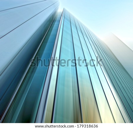 Panoramic and perspective wide angle view to steel light blue background of glass highrise building skyscraper, modern futuristic commercial city Business concept of successful industrial architecture