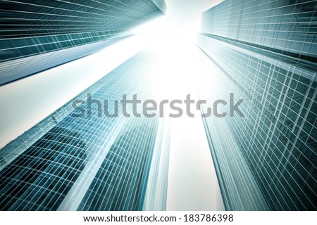 Panoramic and prospective wide angle view to steel light blue background of glass highrise building skyscraper, modern futuristic commercial city Business concept of successful industrial architecture