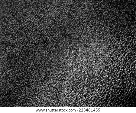Perspective and closeup view to abstract dark space of empty black natural clean leather texture for the traditional business background in luxury grunge color
