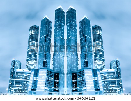 perspective view to glass high-rise building skyscrapers at nigh