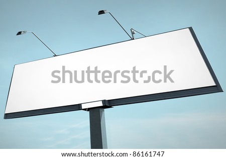 White big billboard over blue sky in the evening