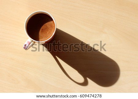 Cup of morning coffee with milk. Natural sunlight Zdjęcia stock © 