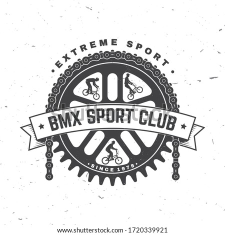 Bmx extreme sport club badge. Vector illustration. Concept for shirt, logo, print, stamp, tee with sprocket, chain. Vintage typography design with bmx cyclist, bmx sprocket and chain silhouette.