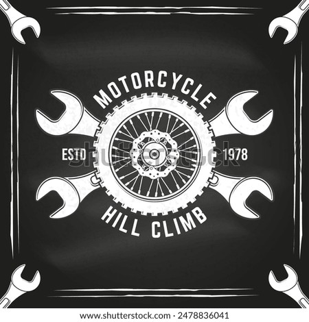 Motorcycle hill climb logo, badge, sticker on the chalkboard. Vector illustration. Extreme sport with motorcycle wheel and wrenches. Monochrome style motorcycle wheel and wrenches