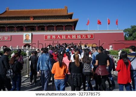 BEIJING, CHINA - OCT 2015: The tourists in the Forbidden City in Beijing on Oct 11, 2015.  The Forbidden city, which is one of the most famous Beijing landmarks