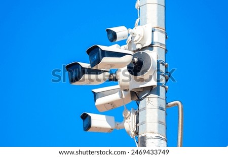 Image, Stock Photo Pole with city cameras against blue sky