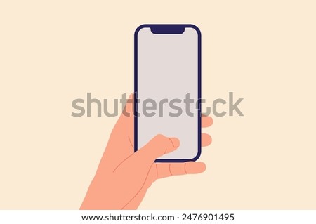 Hand holding phone. Phone in a man's hand