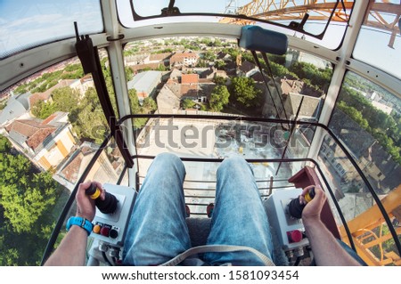 Image, Stock Photo View of a crane in front of a cloudy sky