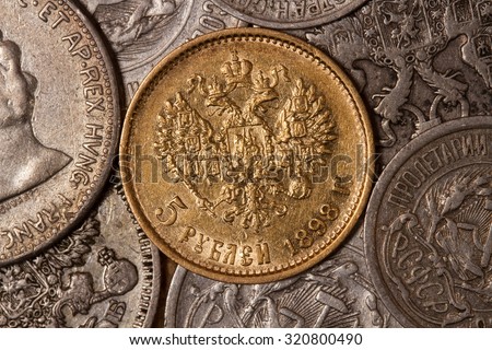 Golden royal coin . Five rubles Nicholas II . Russian silver coins of the early twentieth century