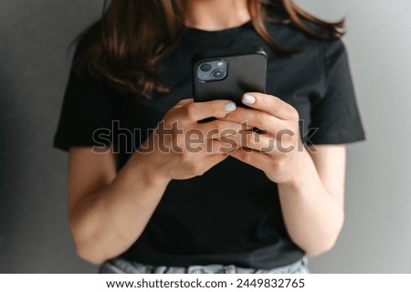 Image, Stock Photo Faceless shot of young female in yellow shirt sitting in her sewing workshop in front of the colorful threads