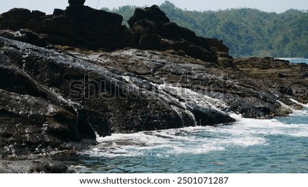 Similar – Image, Stock Photo Seascape with rocky shore during sunset