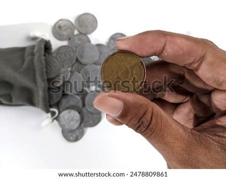 Similar – Image, Stock Photo hand holding 500 coins indonesian rupiah