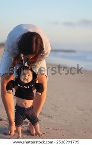 Similar – Image, Stock Photo Young mom walking with her baby during covid pandemic