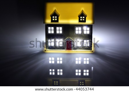 One house lit at night