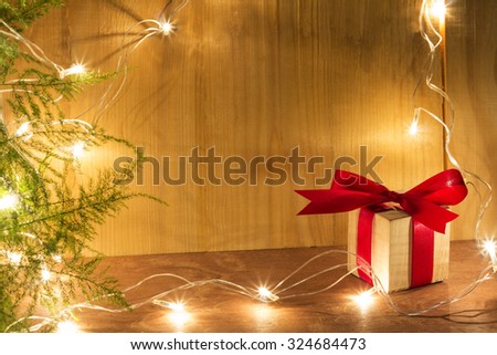 Merry Christmas ,happy new year,  gifts wood and fire in wood background/selective focus