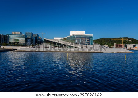 OSLO, NORWAY - JUNE 15: Beautiful view from the fjord to the National Oslo Opera House on June 15, 2015 in Oslo, Norway
