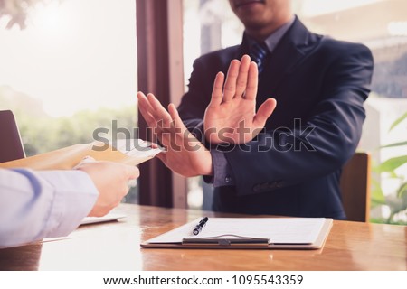Business man refusing money to take the bribe the concept of corruption and anti bribery Foto stock © 