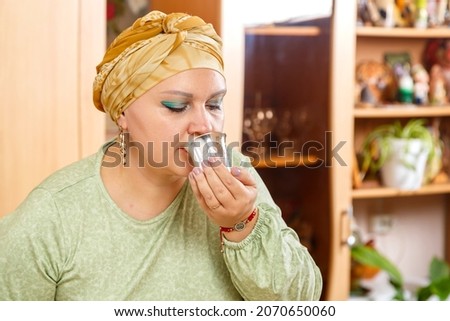 Similar – Image, Stock Photo Woman in turban drinking coffee