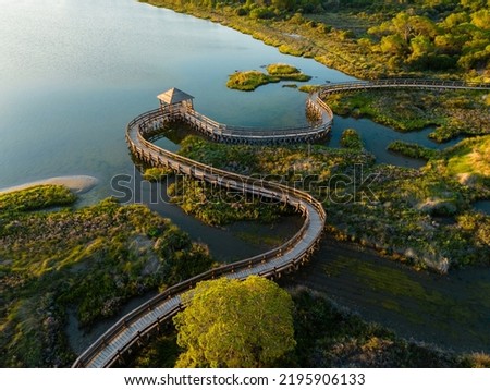 Similar – Image, Stock Photo Bridge over sea on cloudy day