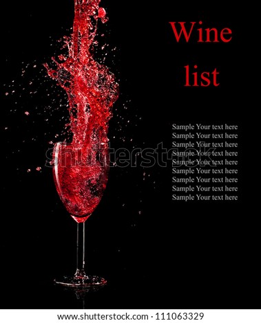 Red wine splashing out of glass, concept of wine list.