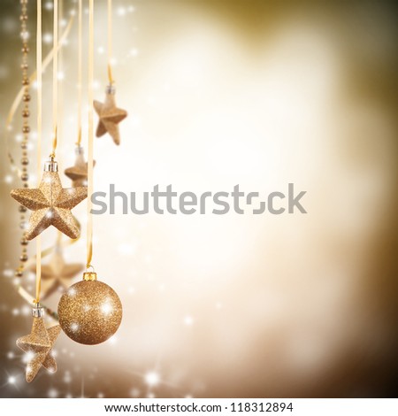 Christmas theme with golden glass stars and free space for text