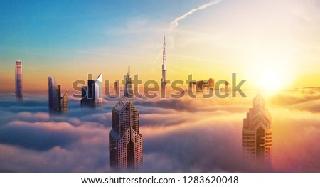 Similar – Image, Stock Photo The impressive skyline of the Brandenburg Gate in the evening light. With white blue clouds.