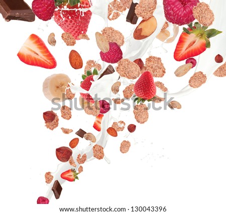 Healthy food and milk with flying cereals and fruit, isolated on white background