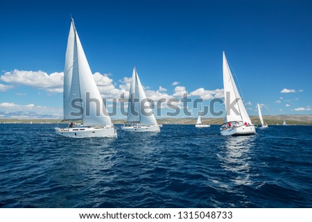 Similar – Image, Stock Photo Regatta at rest Sailboat
