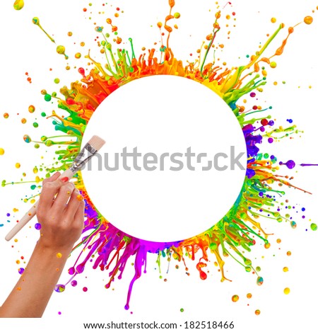 Colored paint splashes in round shape with free space for text in center. Woman hand holding paintbrush. Isolated on white background