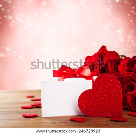 Bouquet of roses on wooden desk