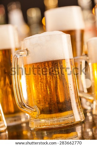 Jug of beer placed on bar counter