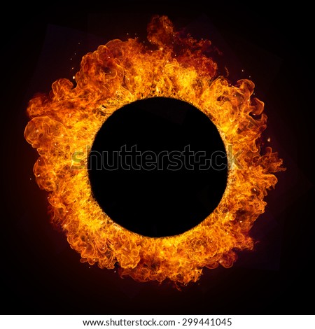 Hot fires flames in rounded shape, isolated on black background. Free copyspace in centre