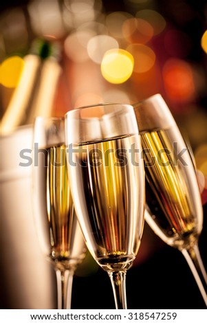 Glasses of champagne in holiday setting, served on bar counter