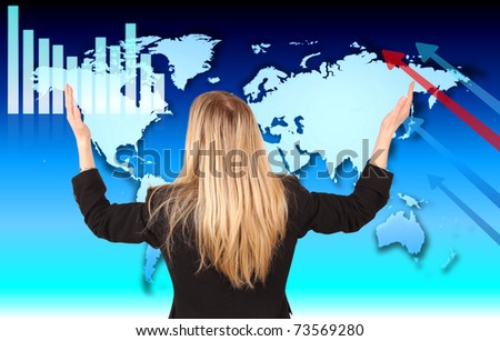 Businesswoman with hands in the air, looking at economic theme in the World