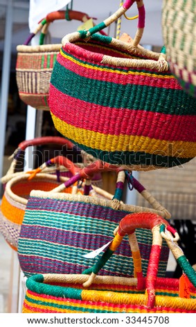 Colorful hand woven baskets for sale at street & craft fair