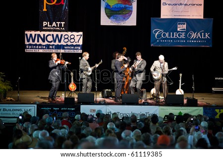 BREVARD, NC, USA - SEPTEMBER 11: The Steep Canyon Rangers perform with surprise guest, comedian Steve Martin, at the bluegrass Mountain Song Festival in Brevard, NC on Sept 11, 2010