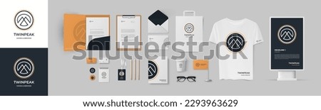 Brand image trademark with mountain in circle logo on orange background. Vector set of templates include folder, business card, envelope, A4 form, t-shirt, street lightbox, notepad, paperbag and book.