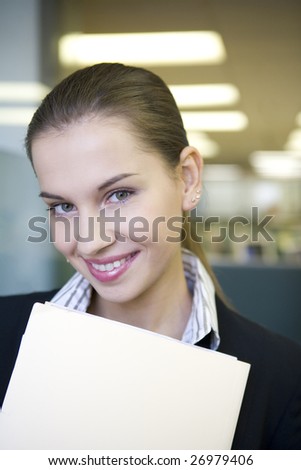 Businesswoman holding file