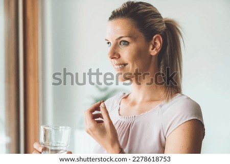 Similar – Image, Stock Photo young caucasian woman taking a picture of her golden retriever dog with mobile phone. Home, indoors