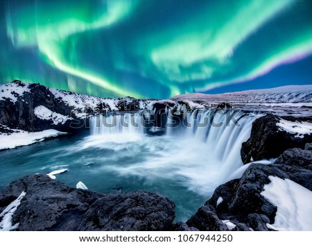 A wonderful night with Kp 5 . Northern lights The Godafoss is a waterfall in Iceland. Stock foto © 