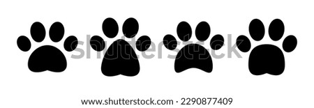 Paw icon vector illustration. paw print sign and symbol. dog or cat paw