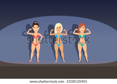 Women Bodybuilders Posing On Stage Women Bodybuilders Posing On Stage