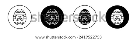 Easter egg icon set. Easter egg icon White Chicken egg in a black filled and outlined style. Easter styled egg sign.
