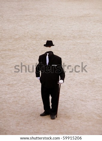 invisible man in outdoors with suit tie and hat