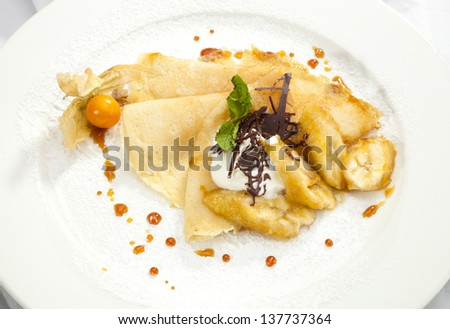 Crepe pancake with grilled banana and chocolate