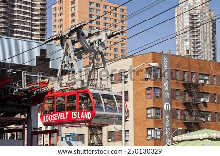 NEW YORK, USA-OCTOBER 9, 2014: The famous Roosevelt Island cable tram car that connects Roosevelt Island to Manhattan Uptown. Each cabin has a capacity up to 110 people and makes app 115 trips per day