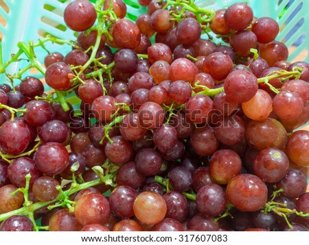 Red grapes in basket