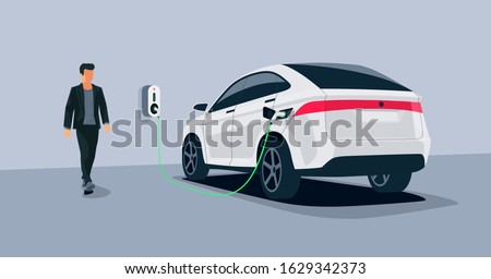 Electric car charging in underground garage home plugged charger station. Vector illustration battery EV vehicle standing parking connected to wallbox. Vehicle being charged with power supply socket. 