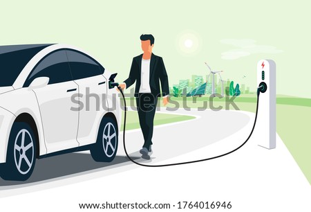 Man charging electric car on city street skyline. Illustration battery EV vehicle plugged in electricity from sustainable renewable power generations solar panel, wind turbine. Vehicle being charged.